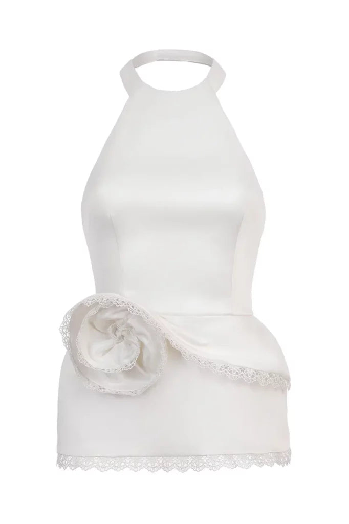 Top with an open back and a frill
