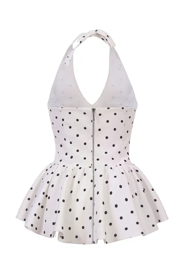 Top with an open back and polka dots