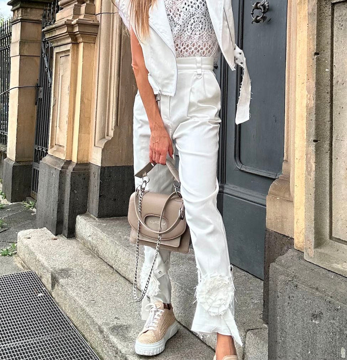 Jeans di Rosa Strappata